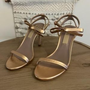 Rose gold heel with bow